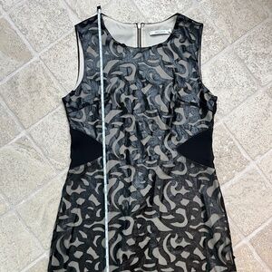 Lucy Paris illusion mini dress with mesh cutouts at waist. Size L